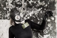 The girl in a gas mask. The threat of ecology.